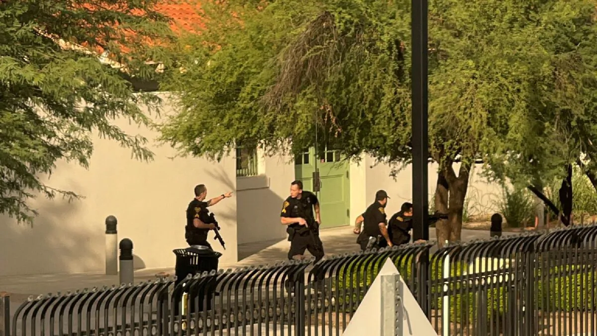A view of security officers near the site of a shooting onboard Amtrak, in Tucson, Ariz., on Oct. 4, 2021. (@evancourtney/via Reuters)