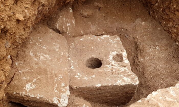 A rare ancient toilet is seen in Jerusalem, Israel, dating back more than 2,700 years. (Yoli Schwartz/Israel Antiquities Authority via AP)