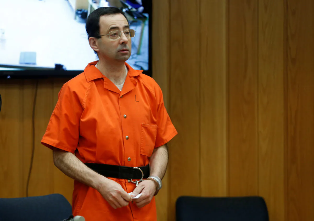 Larry Nassar, a former team USA Gymnastics doctor who pleaded guilty in November 2017 to sexual assault charges, stands in court during his sentencing hearing in the Eaton County Court in Charlotte, Mich., on Feb. 5, 2018. (Rebecca Cook/Reuters)