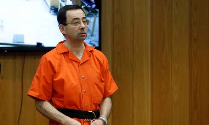 Larry Nassar, a former team USA Gymnastics doctor who pleaded guilty in November 2017 to sexual assault charges, stands in court during his sentencing hearing in the Eaton County Court in Charlotte, Mich., on Feb. 5, 2018. (Rebecca Cook/Reuters)