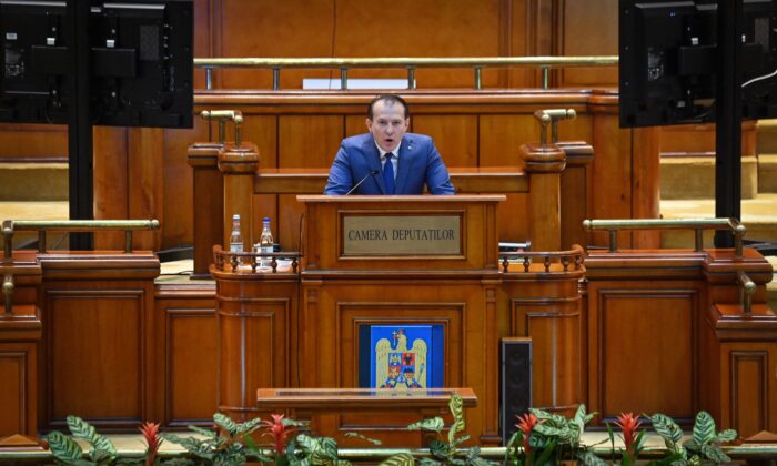 Romanian Prime Minister Florin Citu address to the Romanian Parliament during a non-confidence vote session at the Palace of Parliament in Bucharest, Romania, on Oct. 5, 2021. (Daniel Mihailescu/AFP via Getty Images)