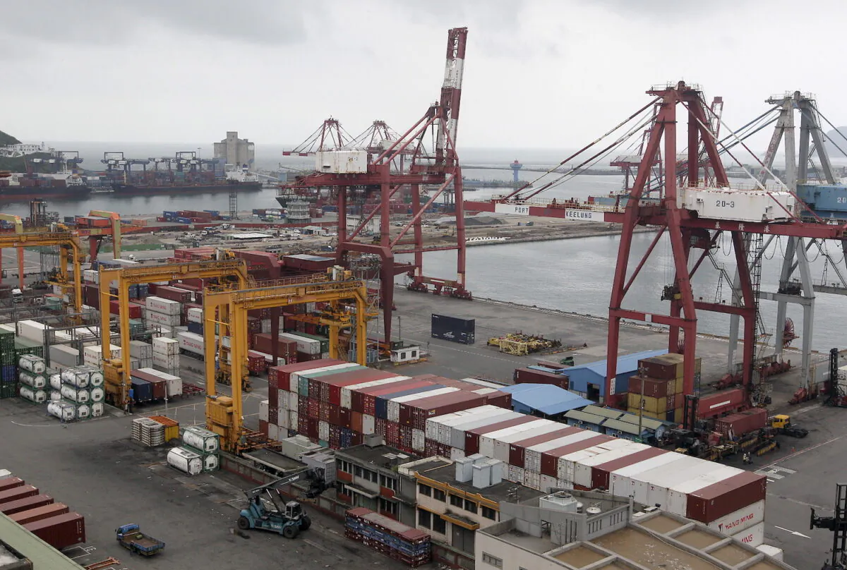 Containers are seen stacked up at Keelung port, northern Taiwan on Oct. 30, 2015. (Pichi Chuang/Reuters)