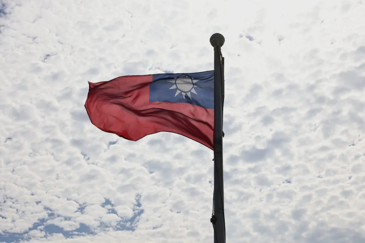 A Taiwanese flag flaps in the wind in Taoyuan, Taiwan, on June 30, 2021. (Ann Wang/Reuters)