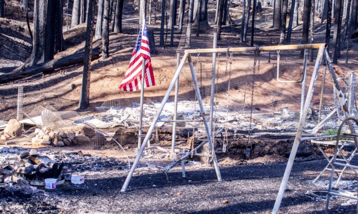 A swing set, burned by the Caldor Fire, in Grizzly Flats on Sept. 26, 2021. (Jacquelin Mullinax/NTD News)