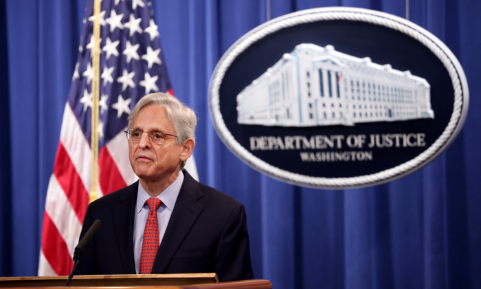 U.S. Attorney General Merrick Garland announces a federal investigation of the City of Phoenix and the Phoenix Police Department during a news conference at the Department of Justice in Washington, D.C., on Aug. 5, 2021. (Kevin Dietsch/Getty Images)