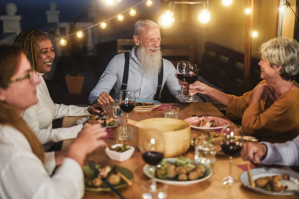 The benefits of sharing multi-generational meals go far beyond the food. (DisobeyArt/Shutterstock)