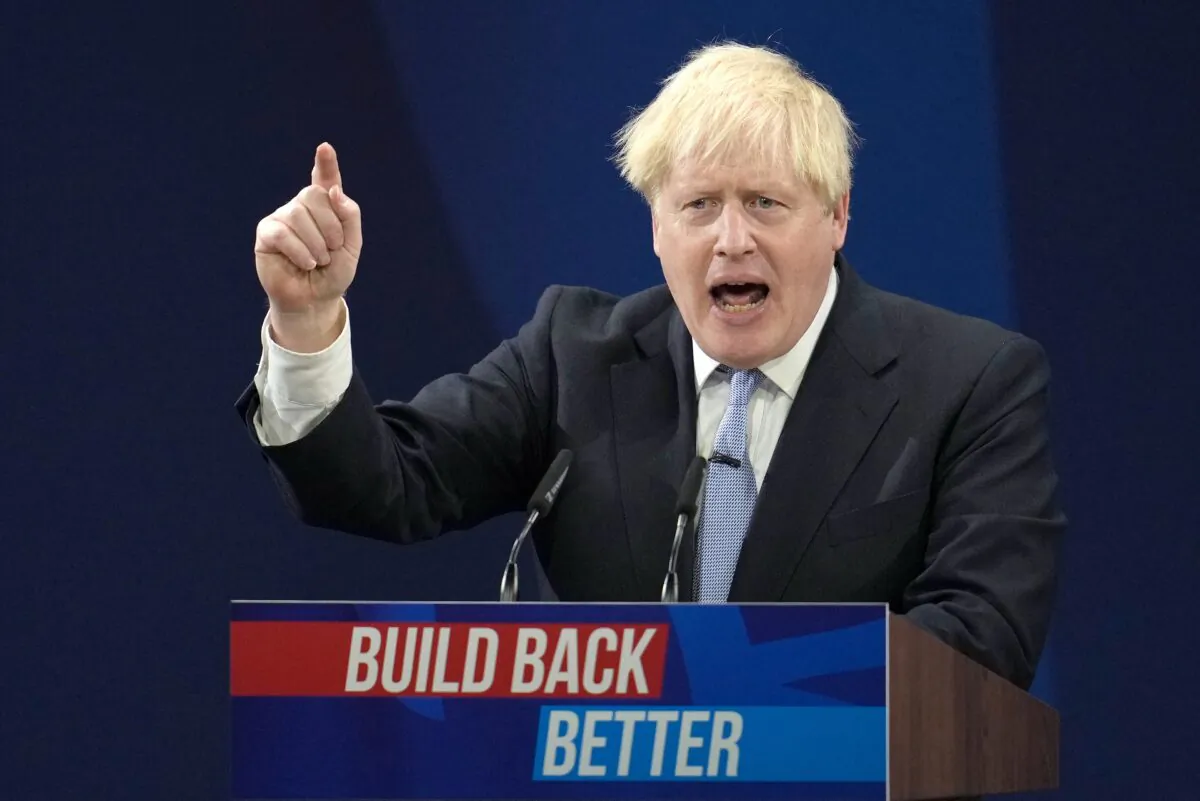 British Prime Minister Boris Johnson delivers his keynote leader's speech during the Conservative Party conference at Manchester Central Convention Complex, England, on Oct. 6, 2021. (Christopher Furlong/Getty Images)