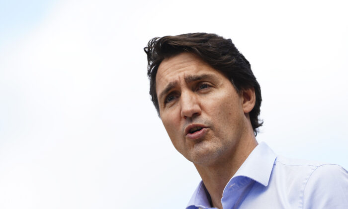 Prime Minister Justin Trudeau speaks to media as he visits a vaccine clinic in Ottawa on Sept. 28, 2021. (The Canadian Press/Sean Kilpatrick)