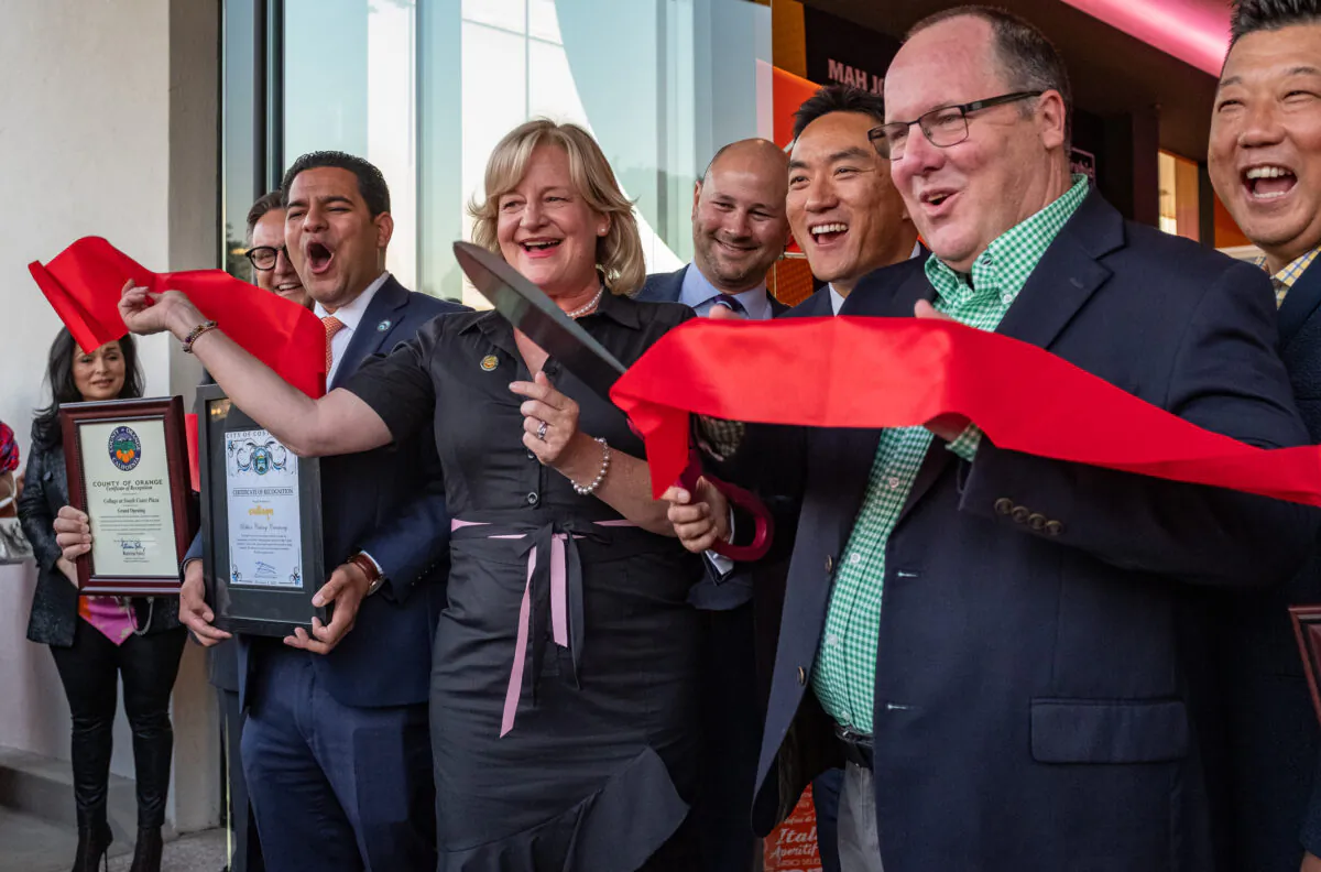 Orange County supervisor Katrina Foley cuts the ribbon for the grand opening of Collage Culinary Experience at South Coast Plaza mall in Costa Mesa, Calif., on Oct. 1, 2021. (John Fredricks/The Epoch Times)
