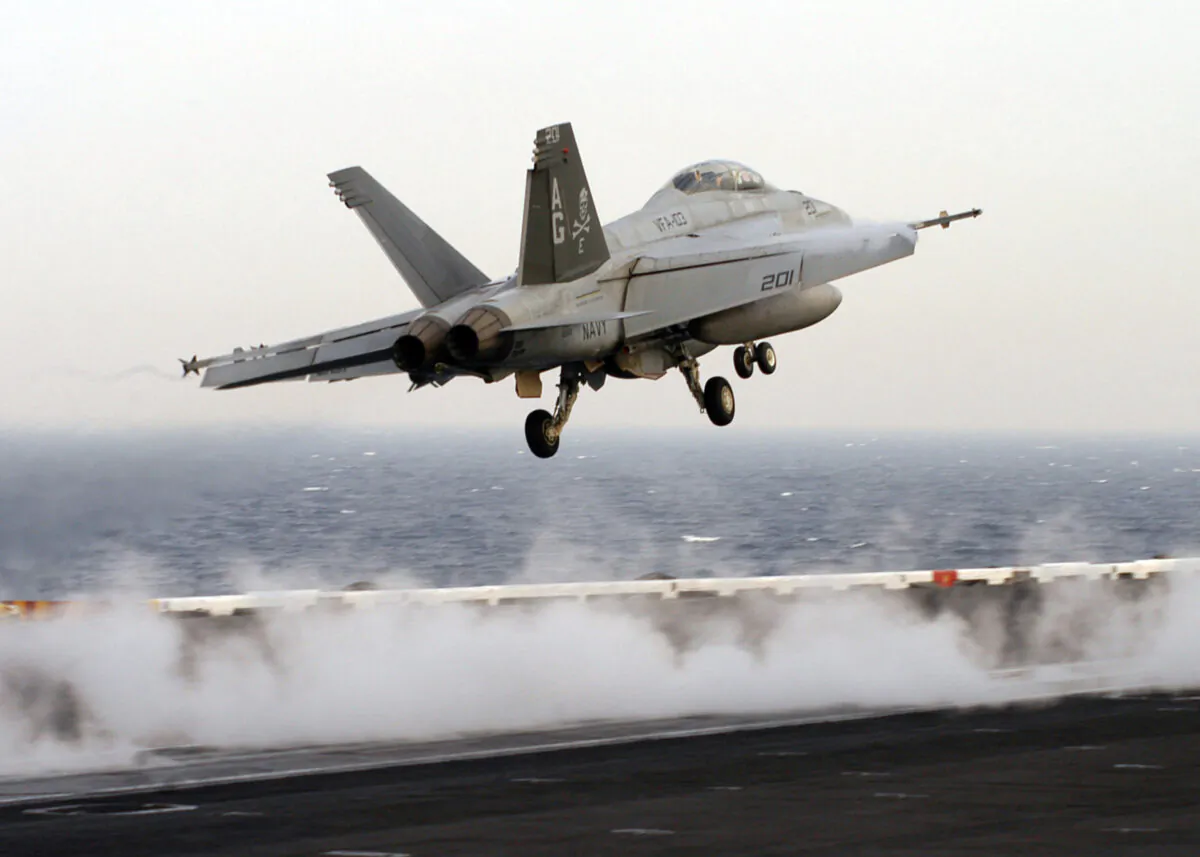 In this file photo, an F/A-18F Super Hornet launches from the flight deck of Nimitz-class aircraft carrier USS Dwight D. Eisenhower, in the Persian Gulf, on March 27, 2007. (Travis Alston/U.S. Navy via Getty Images)