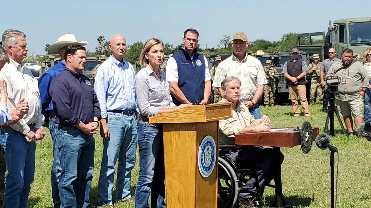 Iowa Gov. Kim Reynolds speaks at a press conference on the border situation while other governors look on, in Mission, Texas, on Oct. 6, 2021. (Marina Fatina/NTD)
