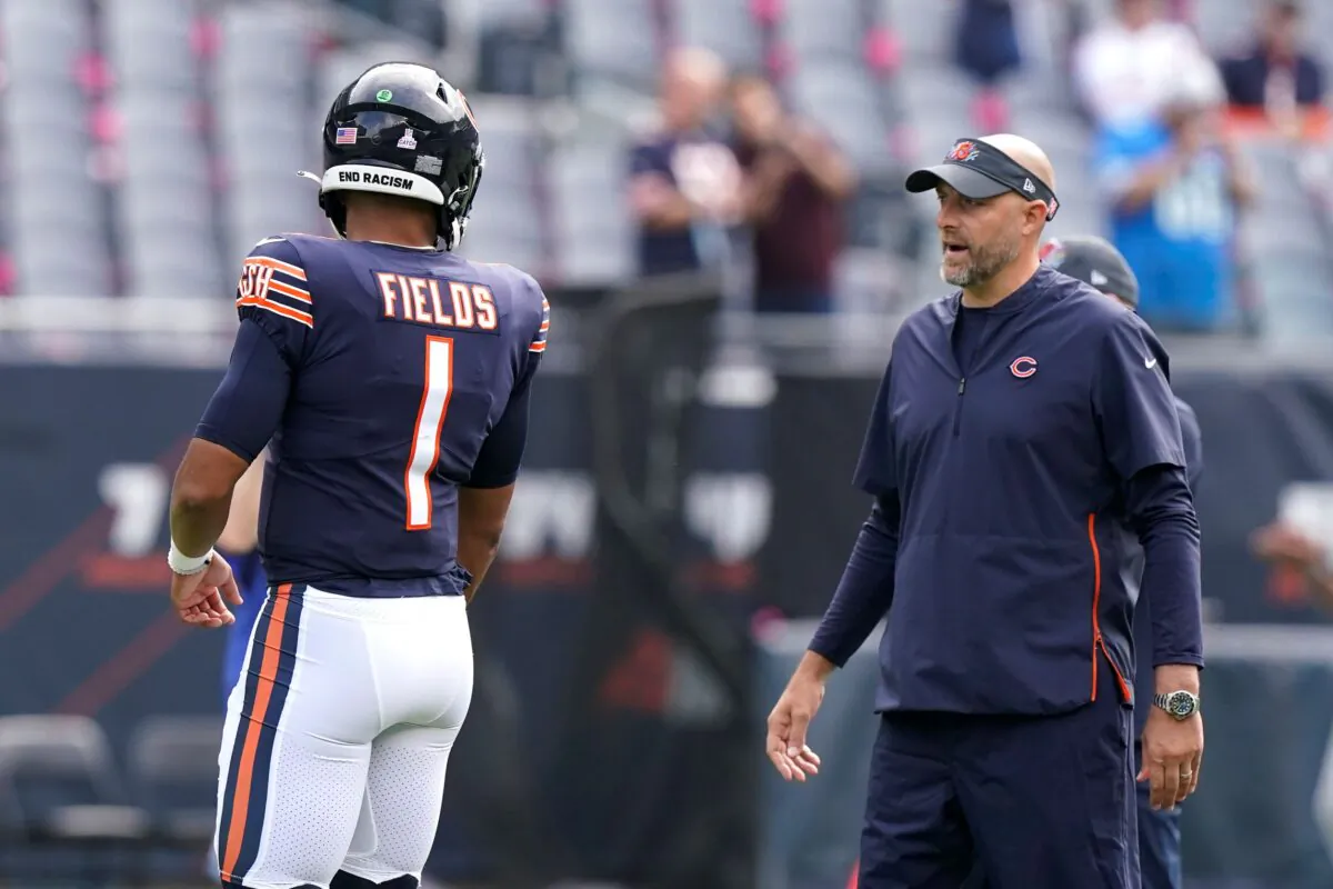 Chicago Bears quarterback Justin Fields listens to head coach Matt Nagy before an NFL football game against the Detroit Lions in Chicago, Ill. on Oct. 3, 2021,. (Nam Y. Huh/AP Photo)