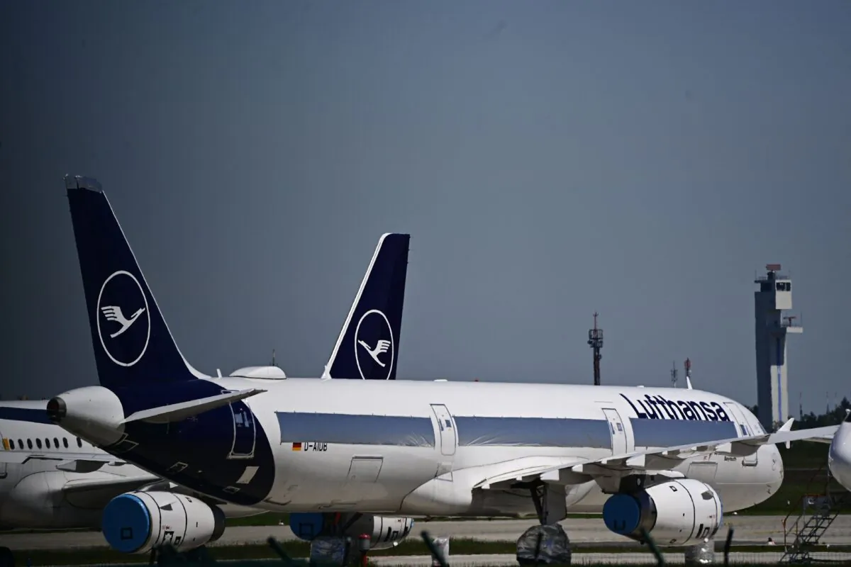 Parked aircrafts operated by German airline Lufthansa are pictured at Berlin Brandenburg BER airport Willy-Brandt in Schoenefeld near Berlin, Germany, on May 31, 2021. (Tobias Schwarz/AFP via Getty Images)