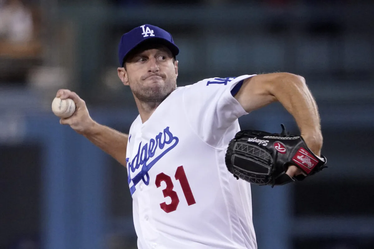 Los Angeles Dodgers starting pitcher Max Scherzer throws to the plate during the first inning of a baseball game against the San Diego Padres in Los Angeles on Sept. 29, 2021. (AP Photo/Mark J. Terrill)