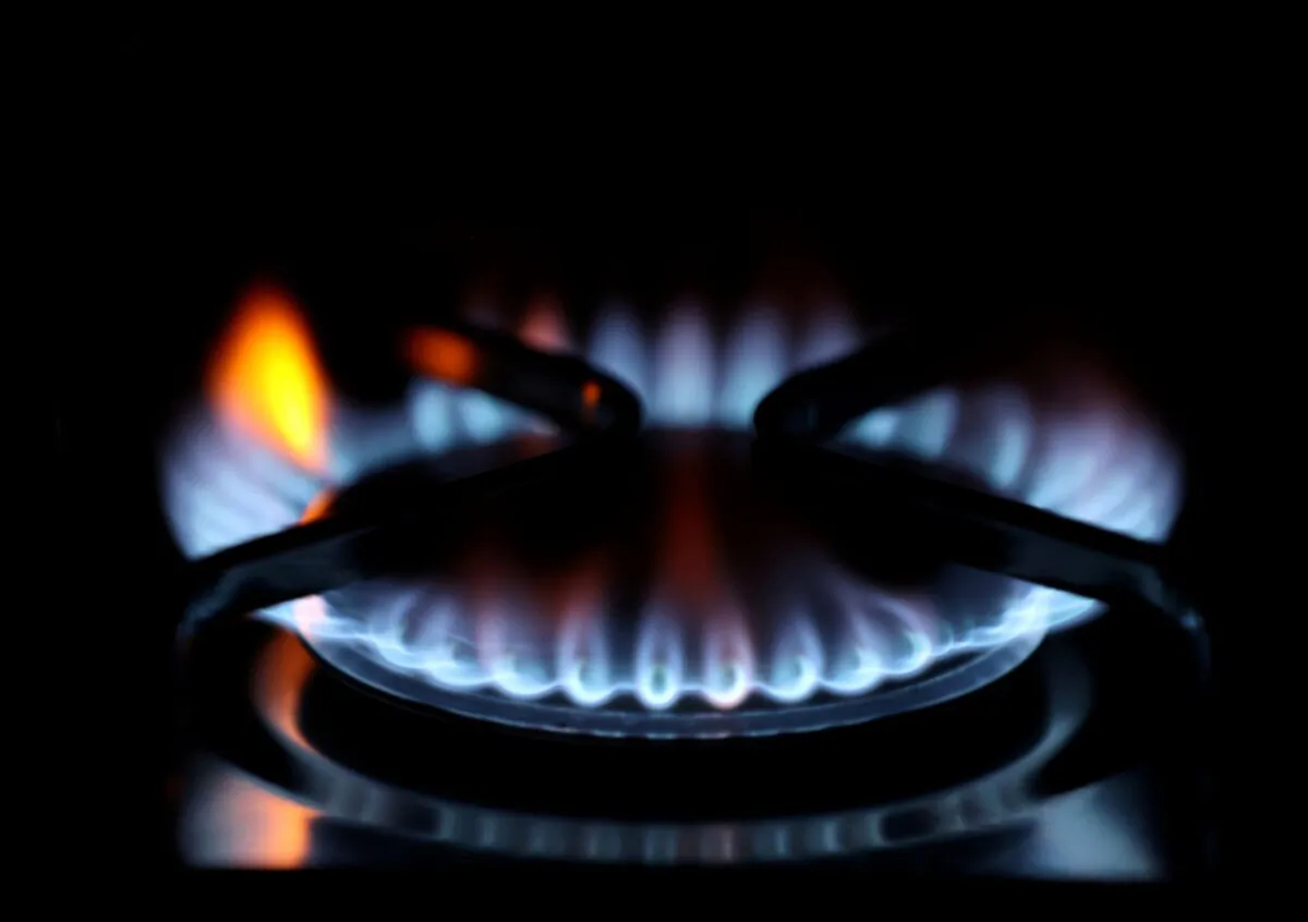 Flames come out of a domestic gas ring of an oven in Durham, Britain, on Sept. 23, 2021. (Lee Smith/Reuters)