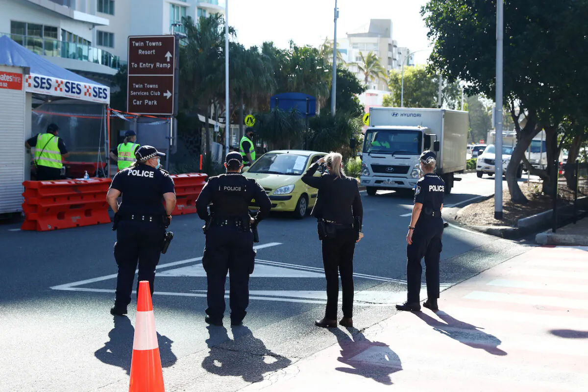 Queensland Police patrol in Coolangatta, Australia, on Aug. 20, 2021. (Chris Hyde/Getty Images)