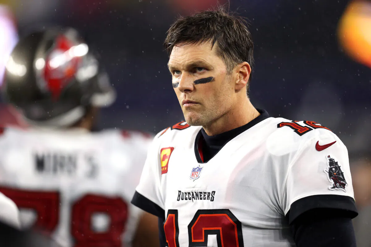 Tom Brady #12 of the Tampa Bay Buccaneers looks on from the bench during the game against the New England Patriots at Gillette Stadium in Foxborough, Mass., on Oct. 3, 2021. (Maddie Meyer/Getty Images)