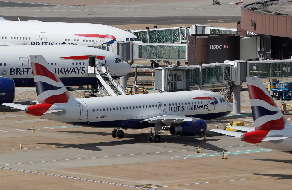 British Airways aircraft are parked at the South Terminal at Gatwick Airport, in Crawley, Britain, on Aug. 25, 2021.  (Peter Nicholls /Reuters)