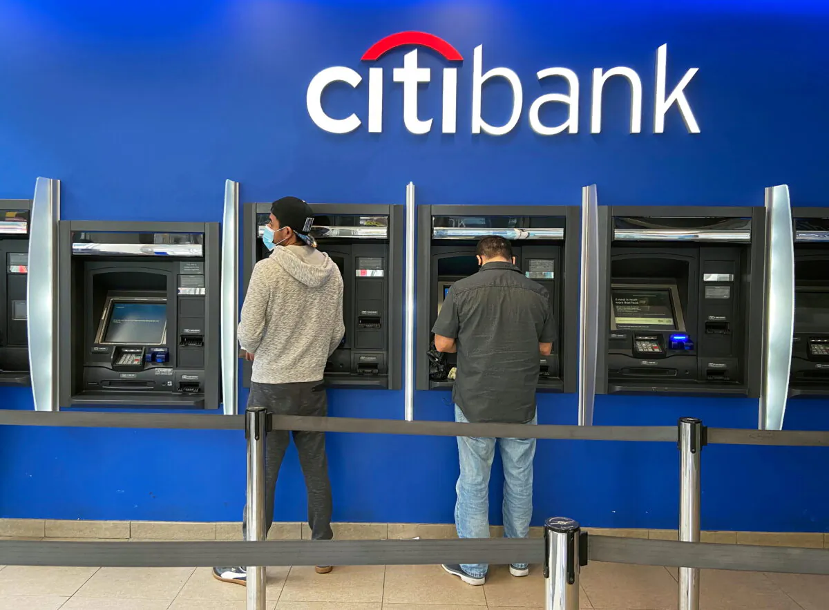 Customers use ATMs at a Citibank branch in the Jackson Heights neighborhood of New York City, on Oct. 11, 2020. (Nick Zieminski/Reuters)