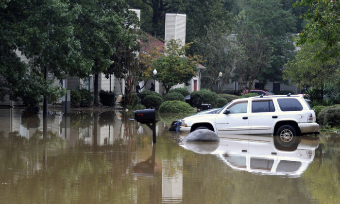 A flooded neighborhood is shown in Pelham, Ala., on Oct. 7, 2021. (Jay Reeves/AP Photo)