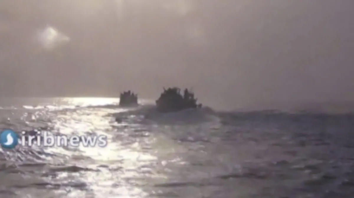 This frame grab from video aired by state-run TV Islamic Republic of Iran Broadcasting (IRIB) on Oct. 7, 2021, shows two vessels in the Persian Gulf. (IRIB via AP)