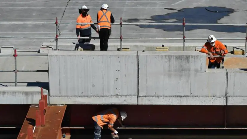 Construction workers at the Barangaroo construction site in Sydney, Australia, on Sept. 23, 2021.  (AAP Image/Joel Carrett)