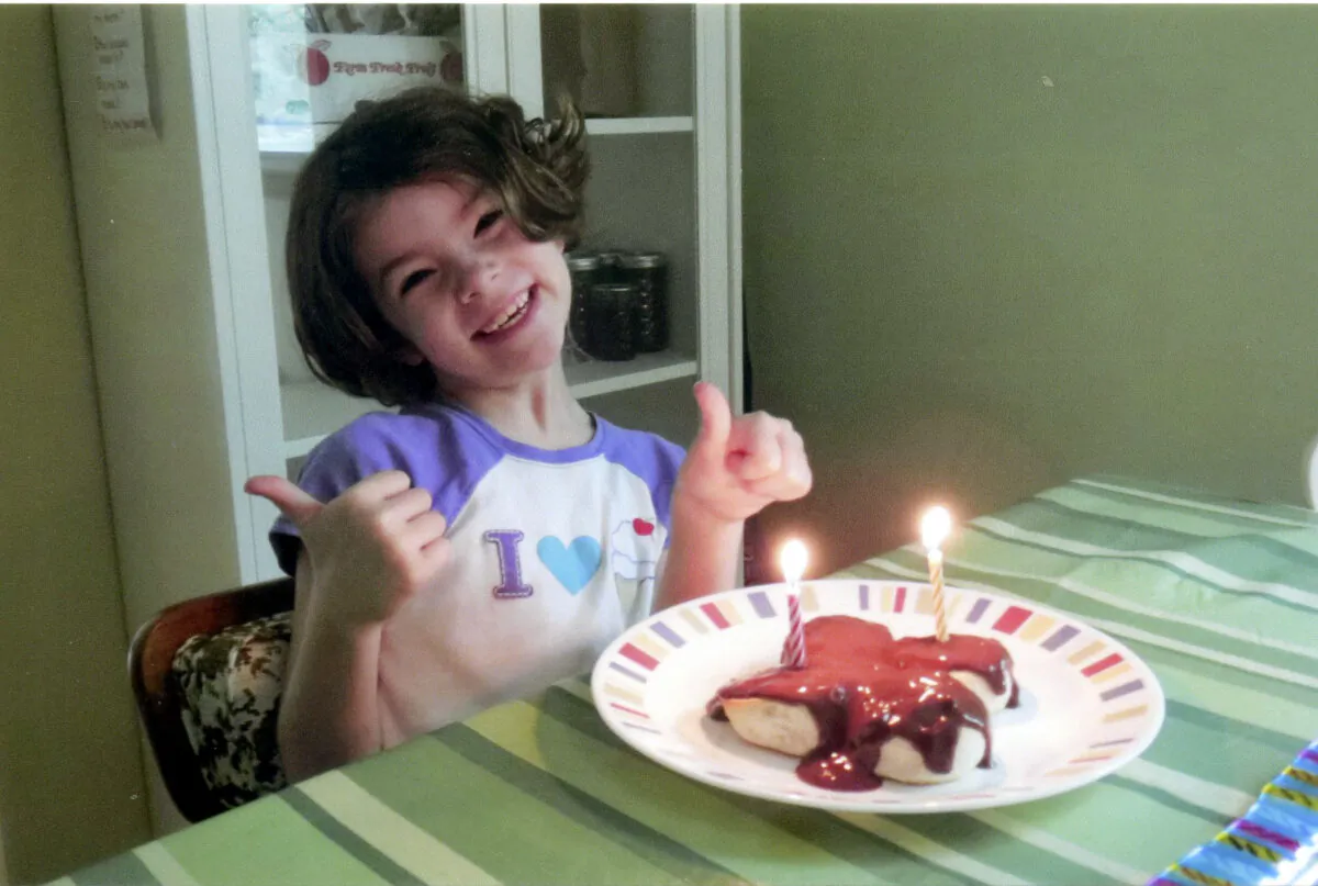 The author's daughter, Novalyne, celebrating her birthday with chocolate pudding and biscuits. (Courtesy of Lanie Montgomery)