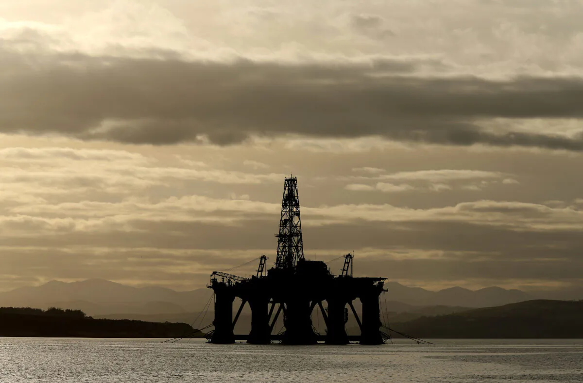 An oil platform stands amongst other rigs which have been left in the Cromarty Firth near Invergordon in the Highlands of Scotland, on Feb. 15, 2016. (Andrew Milligan/PA)