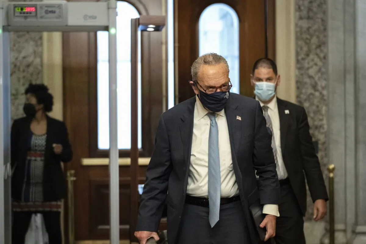 Senate Majority Leader Chuck Schumer (D-N.Y.) arrives at the U.S. Capitol in Washington on Oct. 7, 2021. (Drew Angerer/Getty Images)