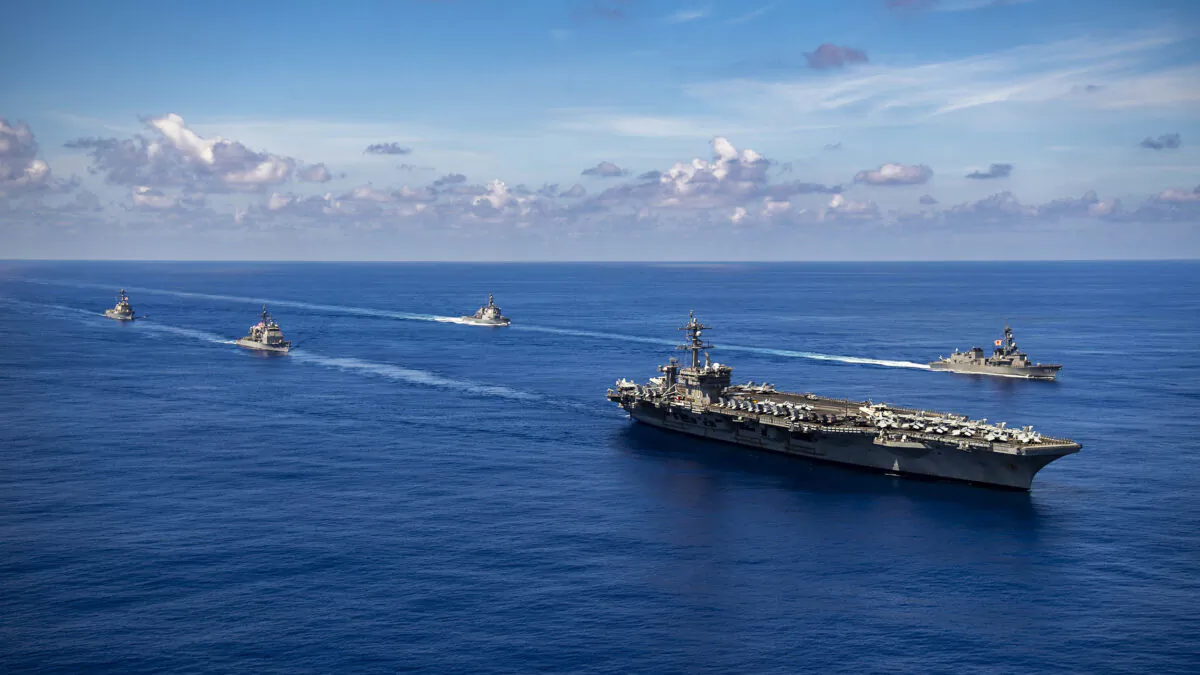 210919-N-HS181-1334 PHILIPPINE SEA (Sept. 19, 2021) Nimitz-class aircraft carrier USS Carl Vinson (CVN 70), Ticonderoga-class guided-missile cruiser USS Lake Champlain (CG 57), and Arleigh Burke-class guided-missile destroyer USS Chafee (DDG 90) conduct a passing honors ceremony with Japan Maritime Self-Defense Force (JMSDF) Murasame-class destroyer JS Ikazuchi (DD 107) and Kongō-class guided-missile destroyer JS Chōkai (DDG 176), Sept. 19, 2021. Carl Vinson Carrier Strike Group is on a scheduled deployment in the U.S. 7th Fleet area of operations to enhance interoperability through alliances and partnerships while serving as a ready-response force in support of a free and open Indo-Pacific region. (U.S. Navy photo by Mass Communication Specialist 2nd Class Haydn N. Smith)