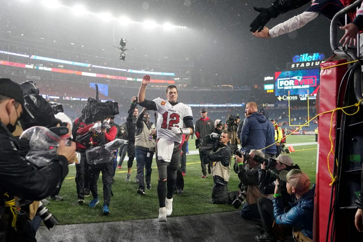 Tampa Bay Buccaneers quarterback Tom Brady (12) waves to fans after defeating the New England Patriots 19–17 in an NFL football game in Foxborough, Mass., on Oct. 3, 2021. (Steven Senne/AP Photo)
