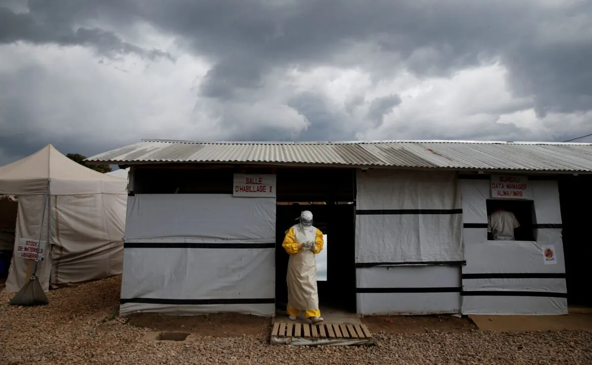 A health worker wearing Ebola protection gear,  before entering the Biosecure Emergency Care Unit (CUBE) at the ALIMA (The Alliance for International Medical Action) Ebola treatment center in Beni, Congo, on March 30, 2019. (Baz Ratner/Reuters)