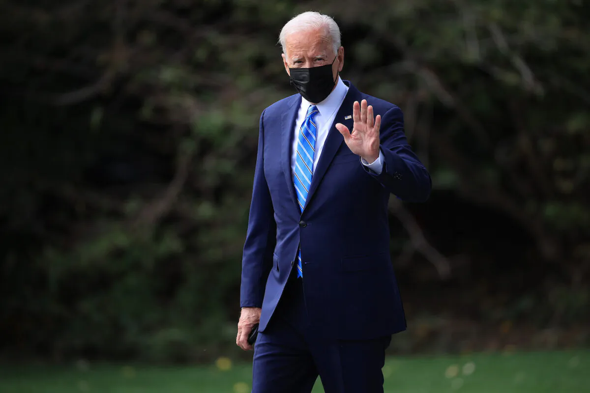 U.S. President Joe Biden walks across the South Lawn as he leaves the White House on Oct. 7, 2021, in Washington, DC. Biden was traveling to the Chicago area to promote his Build Back Better agenda while also encouraging employers have their employees vaccinated. (Chip Somodevilla/Getty Images)