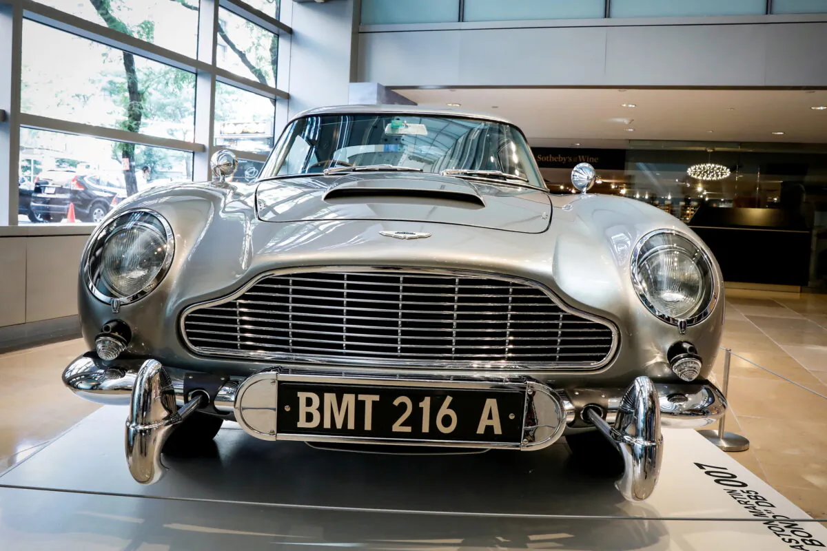 A James Bond 1965 Aston Martin DB5 coupe is displayed at Sotheby's auction house in New York, on July 26, 2019. (Brendan McDermid/Reuters)