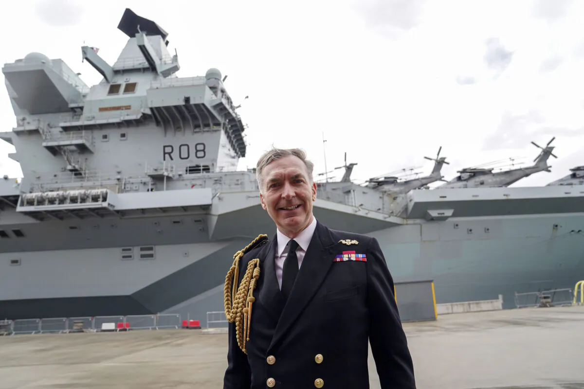 First Sea Lord Admiral Tony Radakin talks to media in front of the HMS Queen Elizabeth at HM Naval Base, Portsmouth, UK, on May 22, 2021. (Steve Parsons/PA)