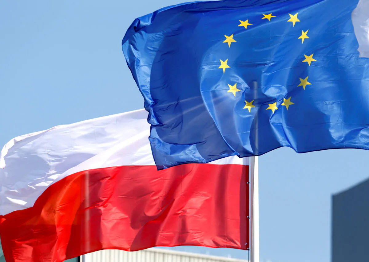 European Union and Polish flags flutter in Mazeikiai, Lithuania, on April 5, 2019. (Ints Kalnins/Reuters)