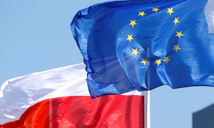 European Union and Polish flags flutter in Mazeikiai, Lithuania, on April 5, 2019. (Ints Kalnins/Reuters)