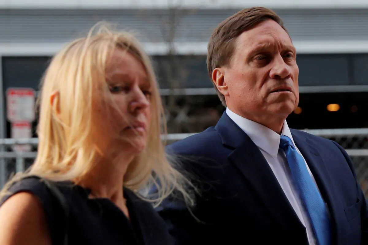 Private equity firm founder John Wilson arrives at federal court for the first day of jury selection in the first trial, in Boston, Mass., on Sept. 8, 2021. (Brian Snyder/Reuters)