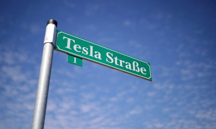 A motion   that reads "Tesla Street" is pictured extracurricular  the operation  tract  of the aboriginal   Tesla Gigafactory, successful  Gruenheide adjacent   Berlin, Germany connected  Aug. 12, 2021. (Hannibal Hanschke/Reuters)