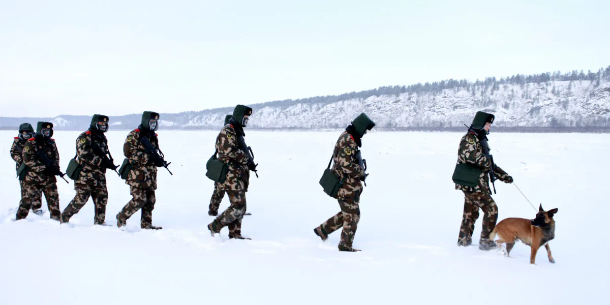 Chinese paramilitary police border guards train in the snow at Mohe County in China's northeast Heilongjiang province, on the border with Russia, on Dec. 12, 2016. Mohe is the northernmost point in China, with a sub arctic climate where border guards operate in temperatures as low as -32 degrees F. (STR/AFP via Getty Images)
