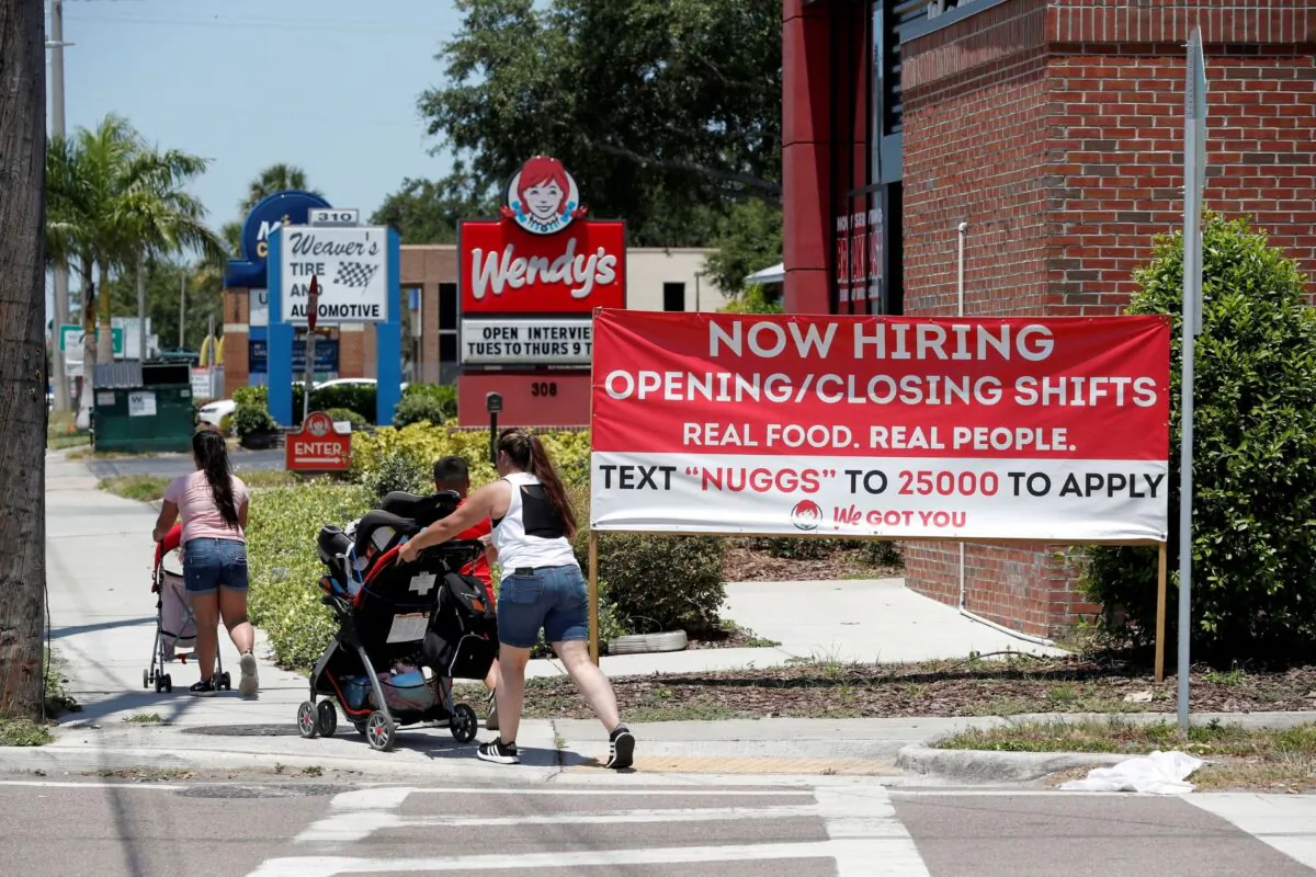 A Wendy’s restaurant displays a "Now Hiring" sign in Tampa, Fla., on June 1, 2021. (Octavio Jones/Reuters)