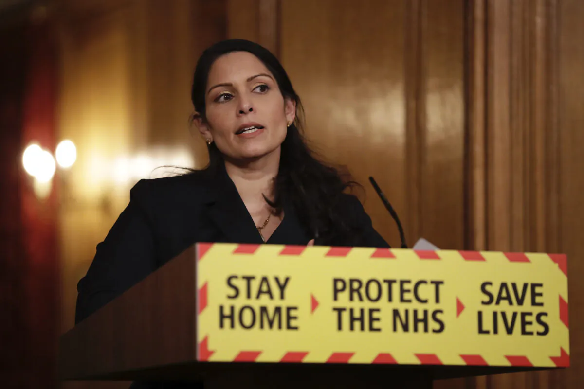 Britain's Home Secretary Priti Patel speaks during a media briefing on the COVID-19 pandemic in Downing Street, London, Jan. 21, 2021. (Matt Dunham, pool/AP Photo)
