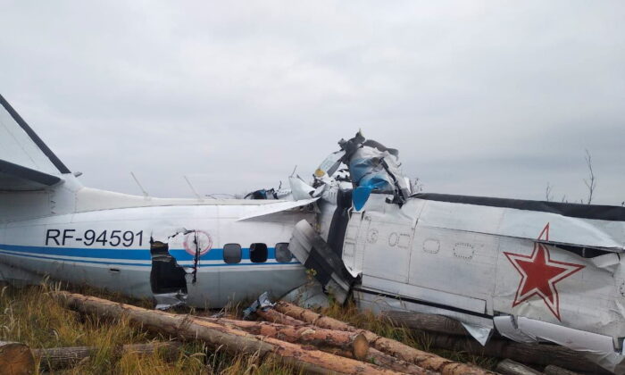  wreckage of the L-410 plane is seen at the crash site near the town of Menzelinsk in the Republic of Tatarstan, Russia, on Oct. 10, 2021. (Russia's Emergencies Ministry/Handout via Reuters)