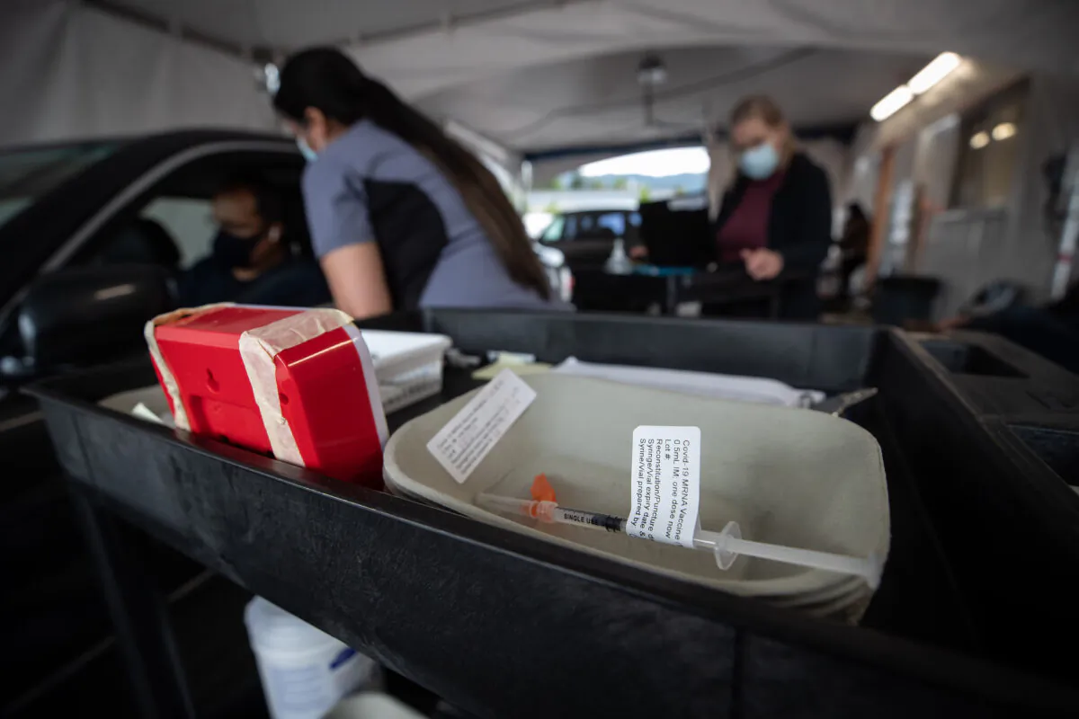 A dose of the Moderna COVID-19 vaccine is seen in a syringe at a Fraser Health drive-thru vaccination site in Coquitlam, B.C., on May 5, 2021. (THE CANADIAN PRESS/Darryl Dyck)