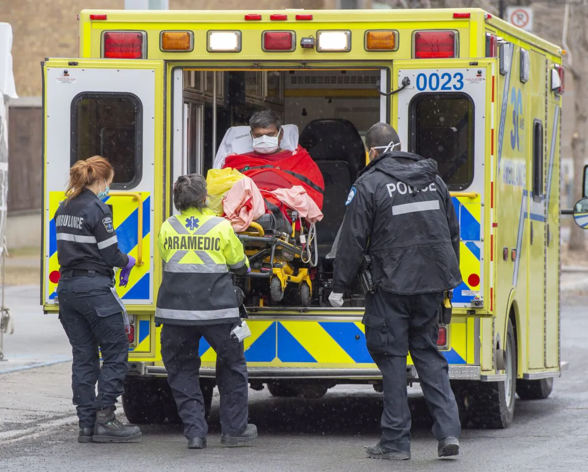 A patient is brought to the emergency department at a hospital in Montreal on April 9, 2020. (The Canadian Press/Ryan Remiorz)