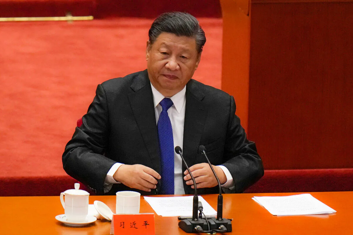 Chinese leader Xi Jinping arrives at an event commemorating the 110th anniversary of the Xinhai Revolution at the Great Hall of the People in Beijing, on Oct. 9, 2021. (Andy Wong/AP Photo)