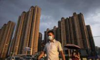 Embattled Evergrande Paid Some Overdue Interest, Averts Default