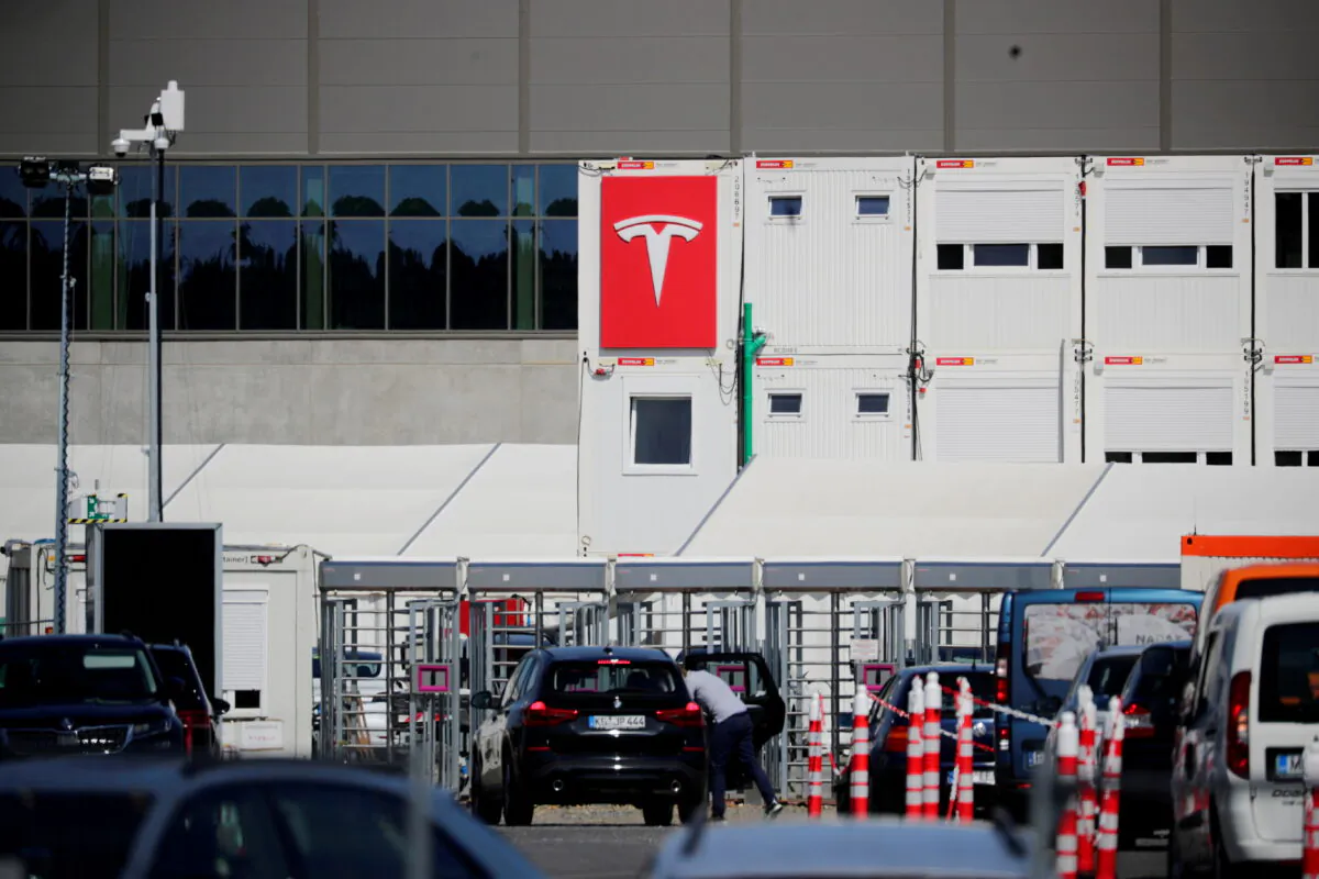 A view shows the entrance to the construction site of the future Tesla Gigafactory in Gruenheide near Berlin, Germany, on Aug. 12, 2021. (Hannibal Hanschke/Reuters)