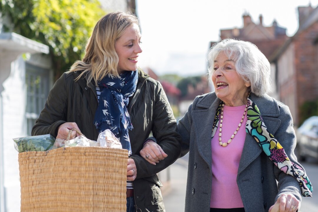 Being of assistance to others helps us feel more connected, and therefore less susceptible to depression and loneliness—factors that especially impact seniors today. (Daisy Daisy/Shutterstock)