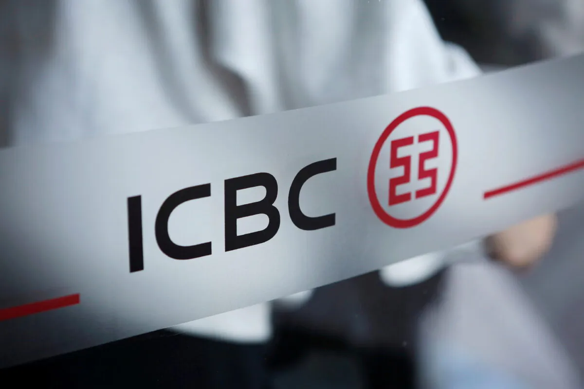 The logo of Industrial and Commercial Bank of China at the entrance to its branch in Beijing on April 1, 2019. (Florence Lo/Reuters)